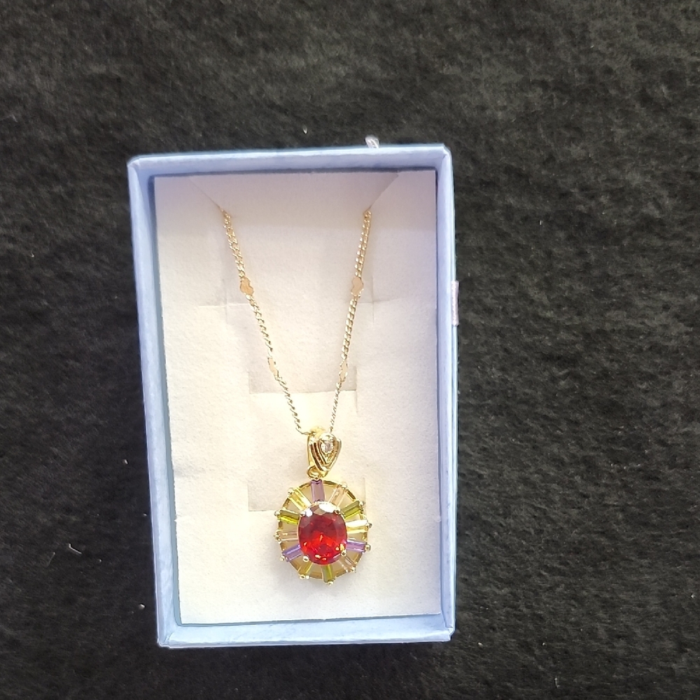 Elegant Gold Necklace with Red Pendant